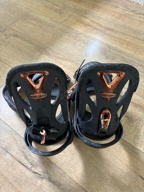 Black Burton Snowboard Bindings with Copper Accents
